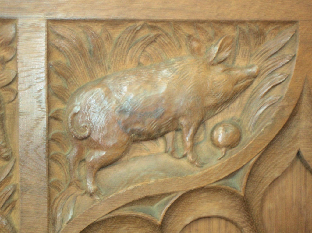 A carved pig on the choir stalls